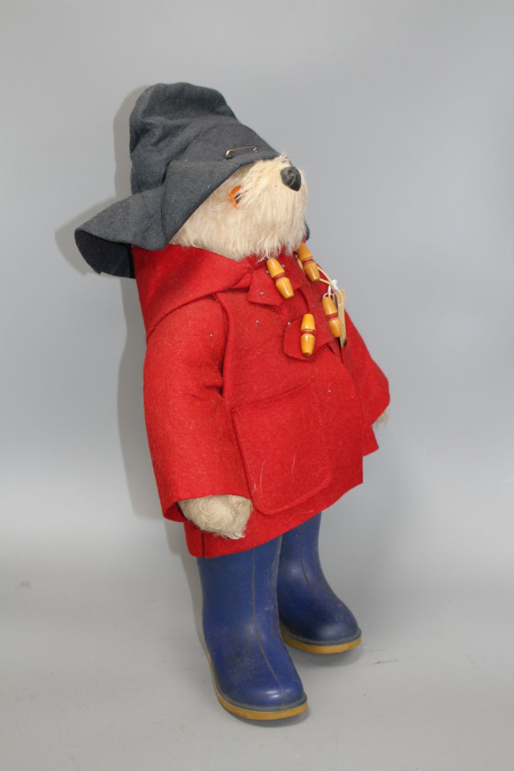 Paddington, original clothes and label Dunlop, 20in.